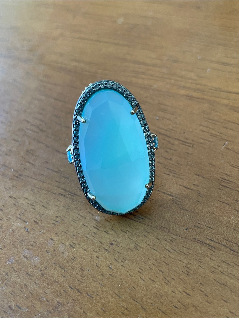 Gold Plated SS Ring with Aqua Chalcedony Stone and Blue & White Topaz Accents.